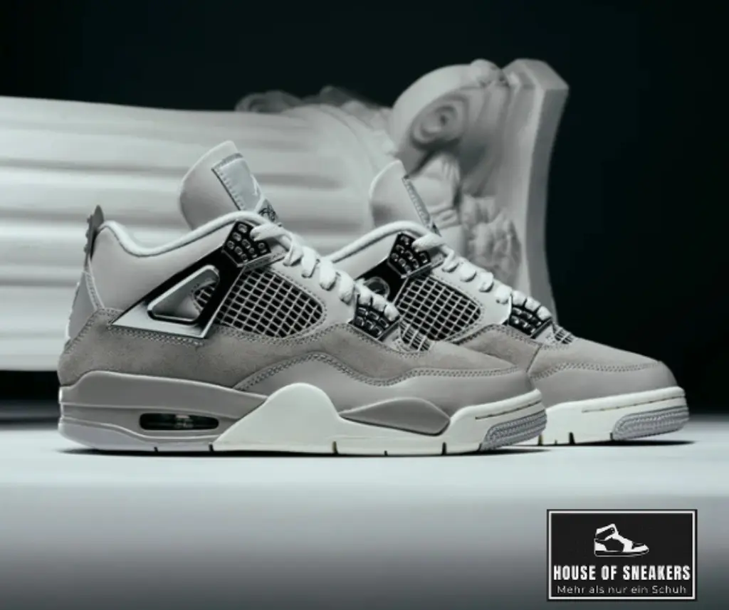 Graue Sneakers auf elegantem Hintergrund - House of Sneakers